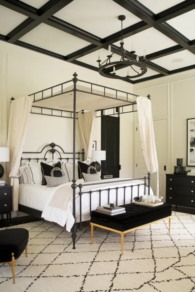 17. Black and Cream Bedroom with a Canopy and Classic Accents