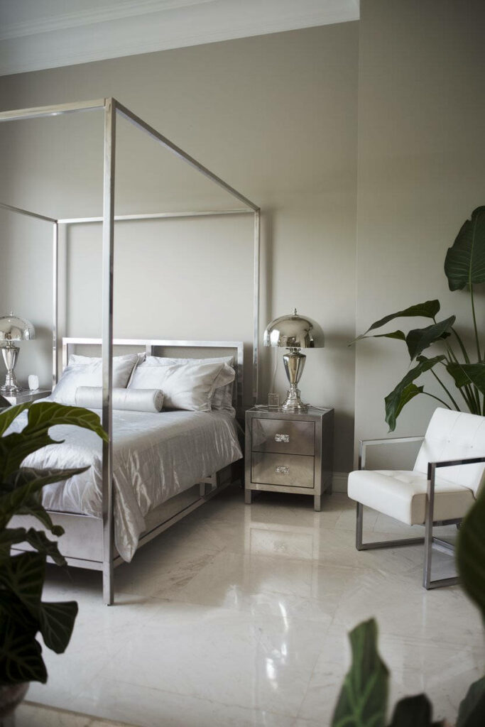 19. Modern Silver Bedroom with Soft Lighting and Neutral Tones