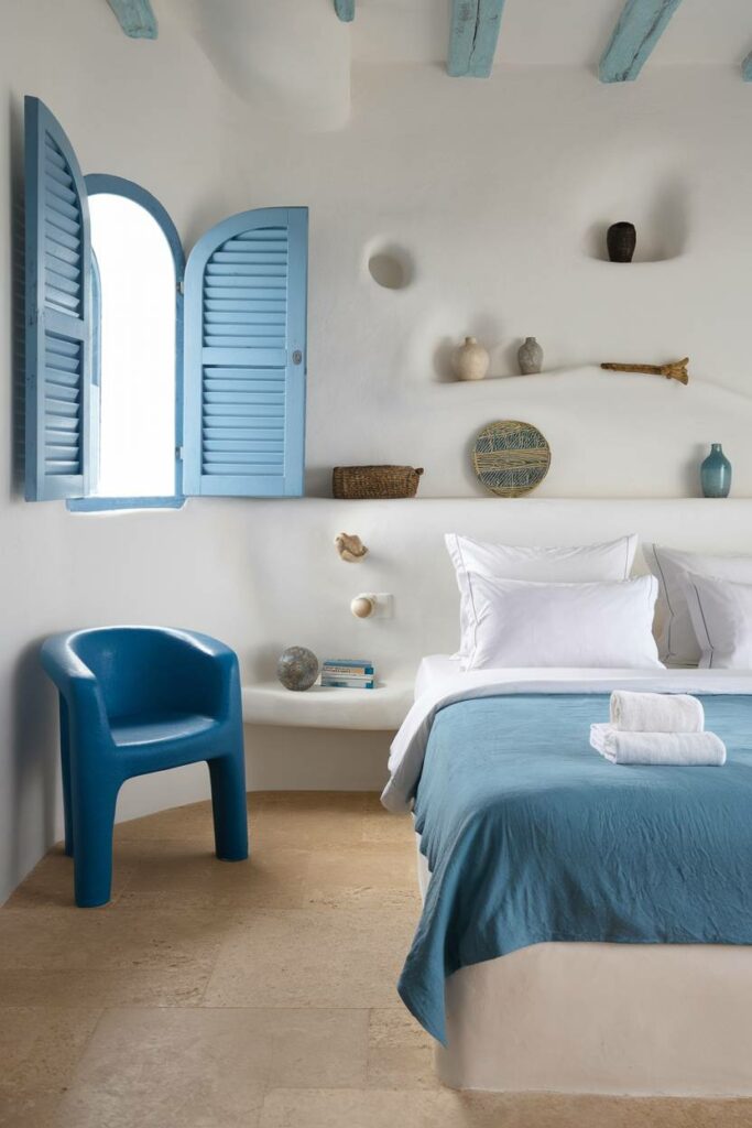 7. Blue Shutters Coastal Bedroom Design