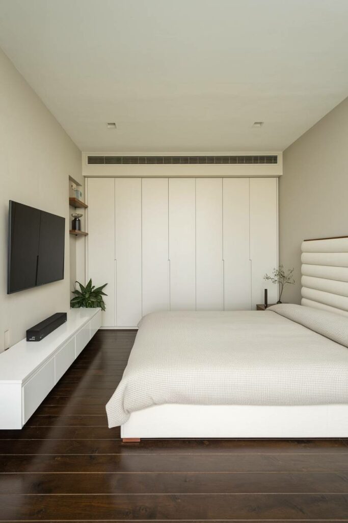 8. King-Size Bed with TV Contemporary Bedroom Design