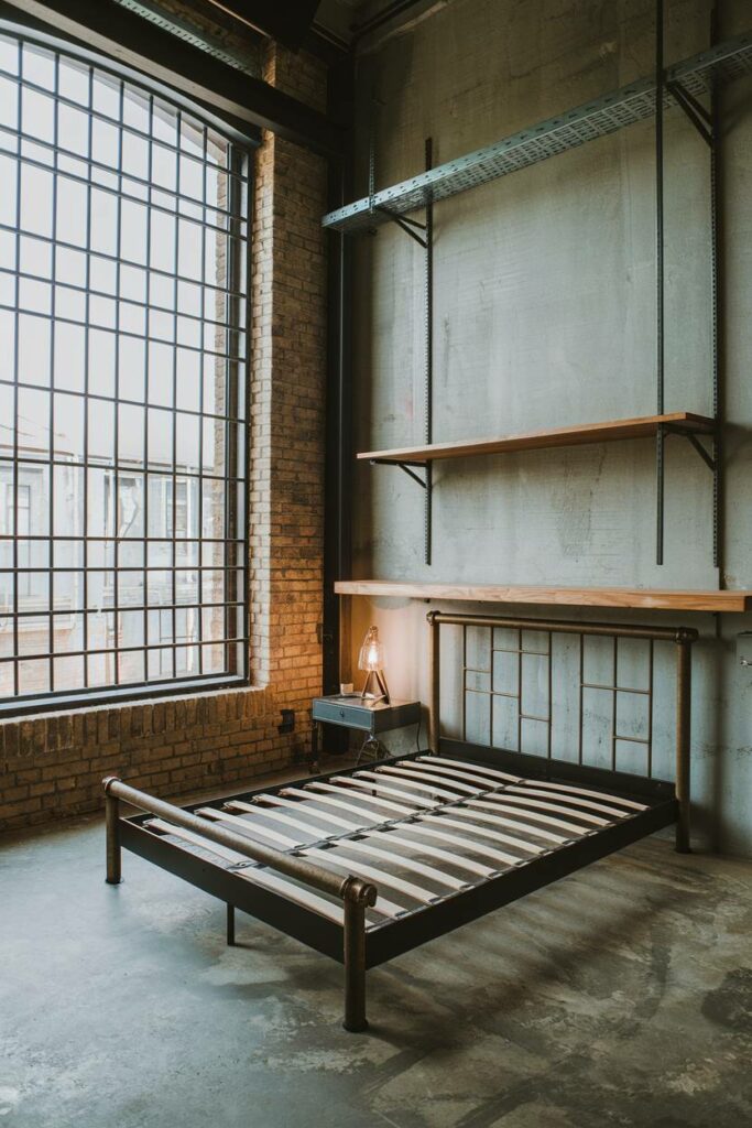 8. Metal and Wooden Bed with Concrete Flooring Industrial Bedroom